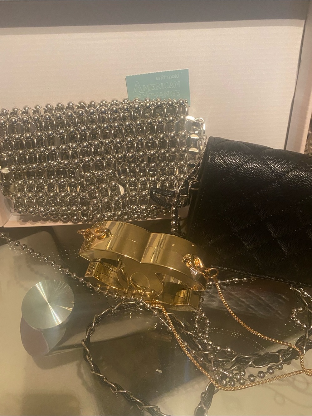 Black Quilted Crossbody Bag with Gold Hardware